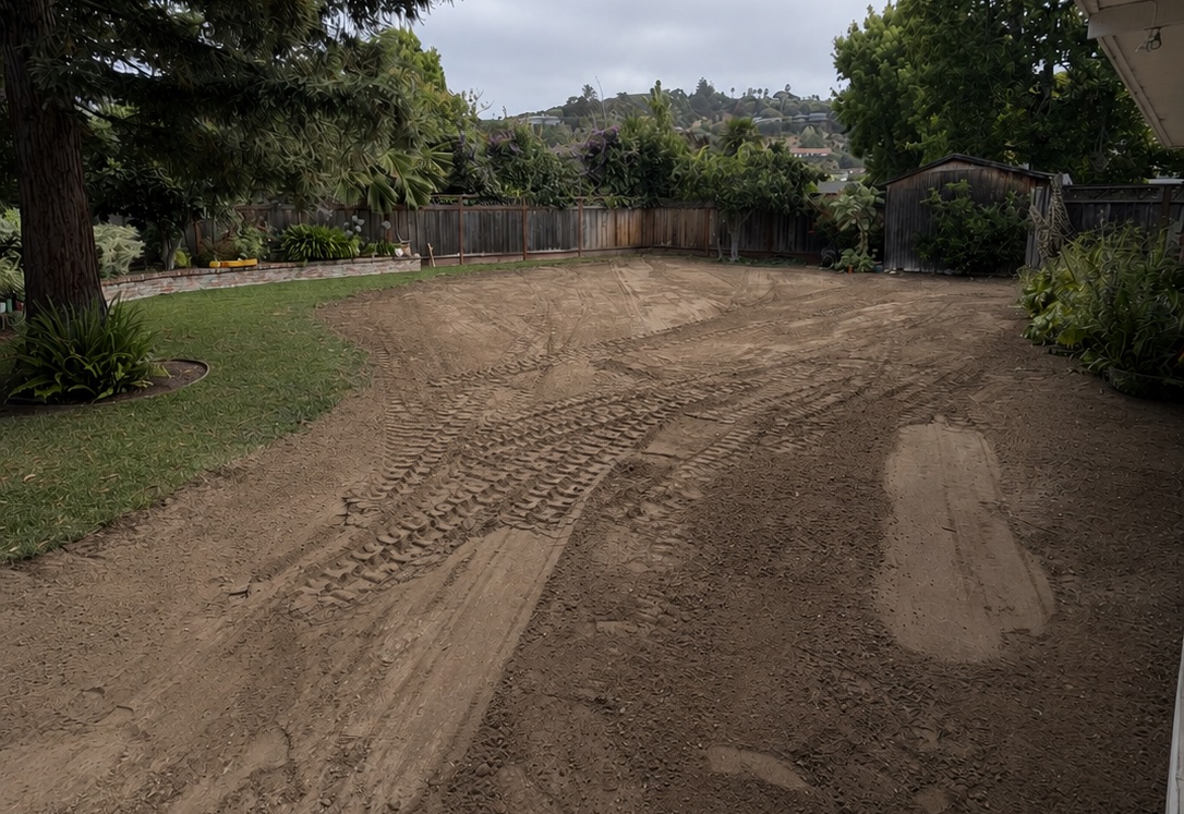 Same backyard after pool removal, backfilled and graded level